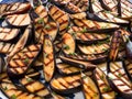 roasted eggplant with garlic and olive oil on the grill