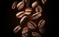 Roasted falling or flying coffee beans on black background, close up, brown texture Royalty Free Stock Photo