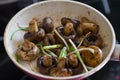 Roasted field mushrooms, champignons being cooked in frying pan Royalty Free Stock Photo