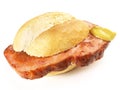 Roasted Fine Meatloaf Slices in a Bread Roll on white Background - Isolated