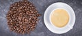 Roasted fragrant coffee grains and hot coffee with milk