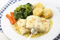 Roasted fresh cod fillet with cabbage and potatoes Royalty Free Stock Photo