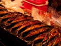 Roasted fried fish as snack street food in China or Thailand Royalty Free Stock Photo