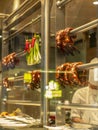 Roasted goose heads and necks hanging in a restaurant window in Hong Kong Royalty Free Stock Photo