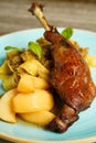 Roasted goose leg with cabbage papardelle pasta and quince compote