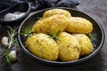 Roasted Hasselback Potatoes with Garlic Rosemary and Salt Royalty Free Stock Photo