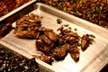 Roasted insects served at Bangkok market