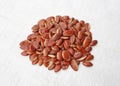 Roasted kayu seeds on white background Irvingia malayana benn