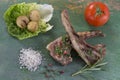 Roasted lamb chops with herbs and pepper Royalty Free Stock Photo