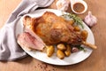 Roasted lamb leg with potatoes Royalty Free Stock Photo