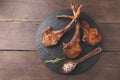 Roasted lamb ribs loin chop on a stone surface Royalty Free Stock Photo
