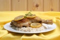 Roasted lemon chicken on organic rice Royalty Free Stock Photo