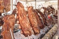 Roasted meat of beef cooking. Asado is traditional Argentine dis Royalty Free Stock Photo