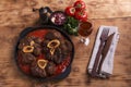 Roasted meat on the bone Osso Buco in tomato sauce