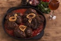 Roasted meat on the bone Osso Buco in tomato sauce Royalty Free Stock Photo
