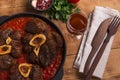 Roasted meat on the bone Osso Buco in tomato sauce Royalty Free Stock Photo