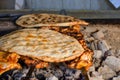 Roasted meat cooked at barbecue. Grilled kebab cooking on metal skewer. BBQ fresh beef meat Royalty Free Stock Photo