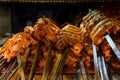 Roasted meat cooked at barbecue. Grilled kebab cooking on metal skewer. BBQ fresh beef meat Royalty Free Stock Photo