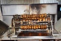 Roasted meat while cooking Royalty Free Stock Photo