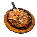 Roasted meat with vegetables on frying pan Royalty Free Stock Photo