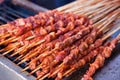 Roasted meat on wood sticks