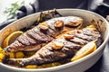 Roasted mediterranean fish bream with potatoes rosemary and lemon