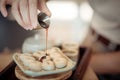 Roasted Mitarashi Dango poured with the sweet sauce, one of the most popular Japanese street food Royalty Free Stock Photo