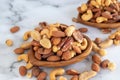 Roasted mixed nuts in wooden bowl