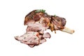 Roasted mutton lamb leg sliced in a wooden tray with meat cleaver. Isolated, white background. Royalty Free Stock Photo