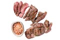 Roasted Mutton leg steaks, sliced lamb meat. Isolated, white background.