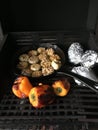 Roasted garlic with peppers and potatoes Royalty Free Stock Photo