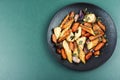 Roasted parsnip root and carrots