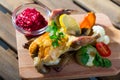 Roasted partridge with cranberry sauce and grilled vegetables