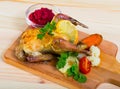 Roasted partridge with cranberry sauce and grilled vegetables