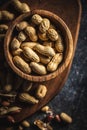 Roasted peanuts. Tasty groundnuts in bowl Royalty Free Stock Photo