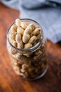 Roasted peanuts. Tasty groundnuts in jar Royalty Free Stock Photo