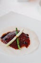 Roasted Peking duck crispy skin with sweet sauce on thin pancake wrap Royalty Free Stock Photo