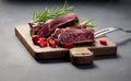 Roasted piece of beef ribeye cut into pieces on a vintage brown chopping board, rare doneness. Delicious steak, close up Royalty Free Stock Photo