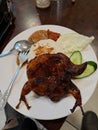 roasted pigeon rice salad and sambal