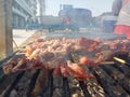 Roasted pork cooked by prolonged exposure to heat over a fire.