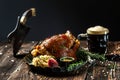 Roasted Pork knuckle with beer and sauerkraut. Oktoberfest menu