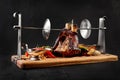 Roasted pork knuckle eisbein with braised boiled cabbage, potatoes, chili peppers and mustard on wooden cutting board Royalty Free Stock Photo