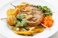 Roasted pork medallion dish with carrot puree and pies