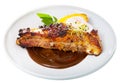 Roasted pork ribs in chocolate sauce with baked potatoes Royalty Free Stock Photo