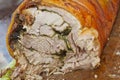 Roasted pork roll. BBQ pork roll baked with spices. Gourmet meat roll. Meat loaf with herbs. Stuffed roasted meat. Delicious pork