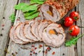 Roasted Pork Roll stuffed with Dried Apricots, Cheese and Walnut Royalty Free Stock Photo