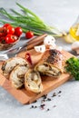 Roasted pork roll stuffed mushrooms and cheese on a board Royalty Free Stock Photo