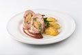 Roasted pork roll stuffed with rice and potatoes Royalty Free Stock Photo