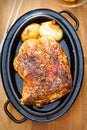 Roasted pork shoulder with onions in gravy Royalty Free Stock Photo