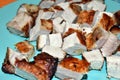 Roast pork steak with bone on a plate background